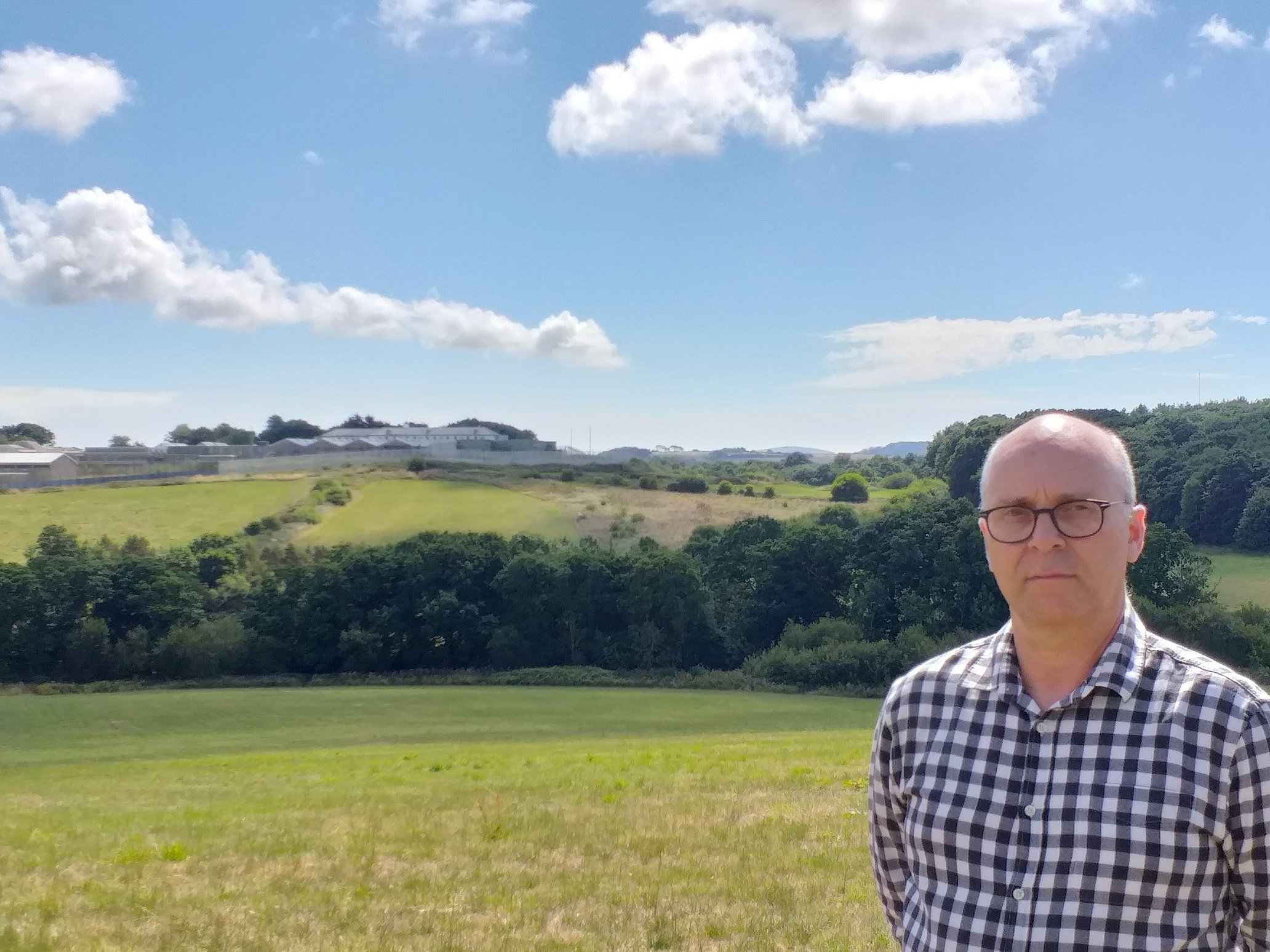 Andrew Garratt with the view over fields to Camp Hill